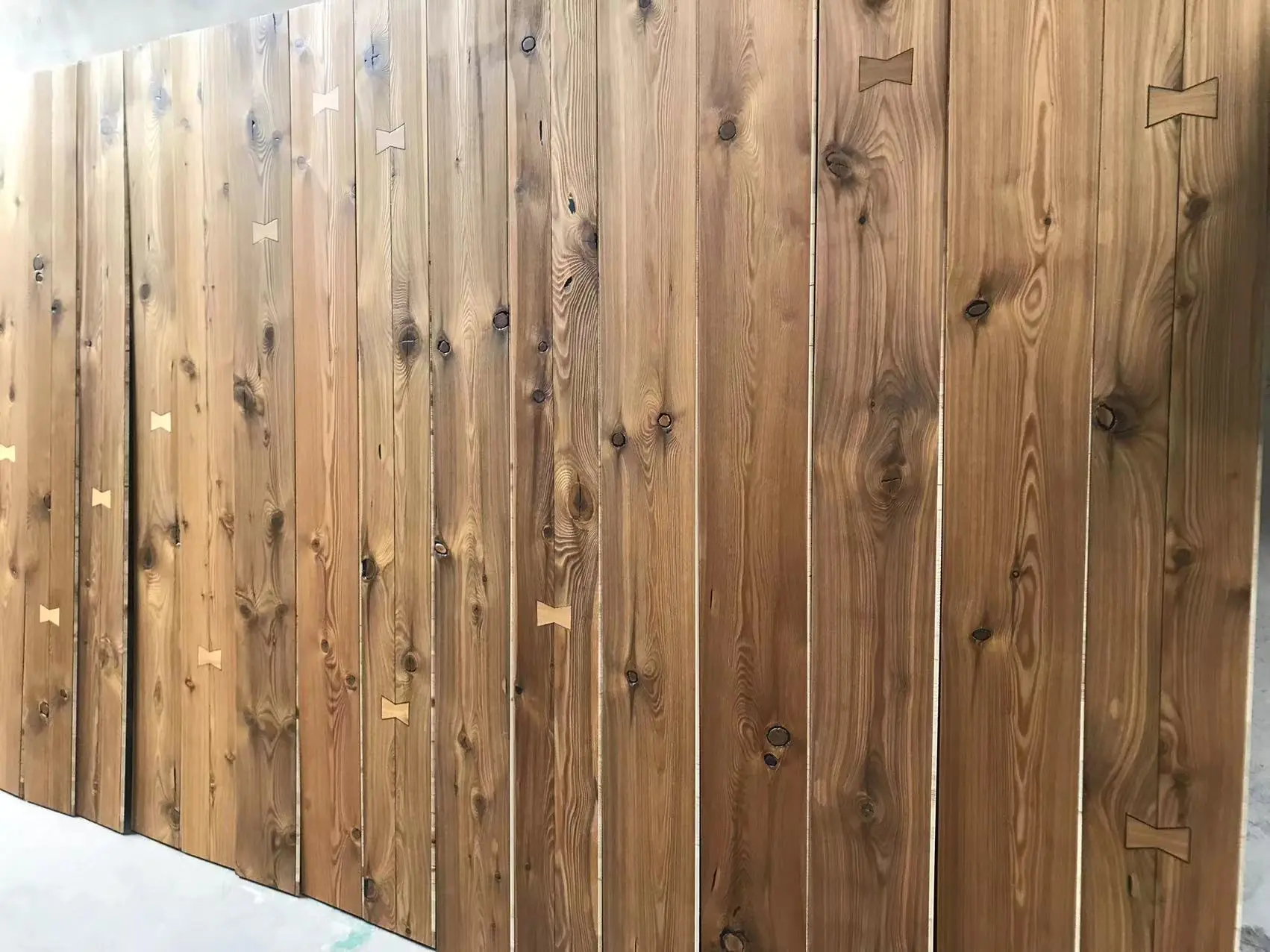 Smoked Antique Larch Wood Flooring with Bowtie | Rustic DD Grade